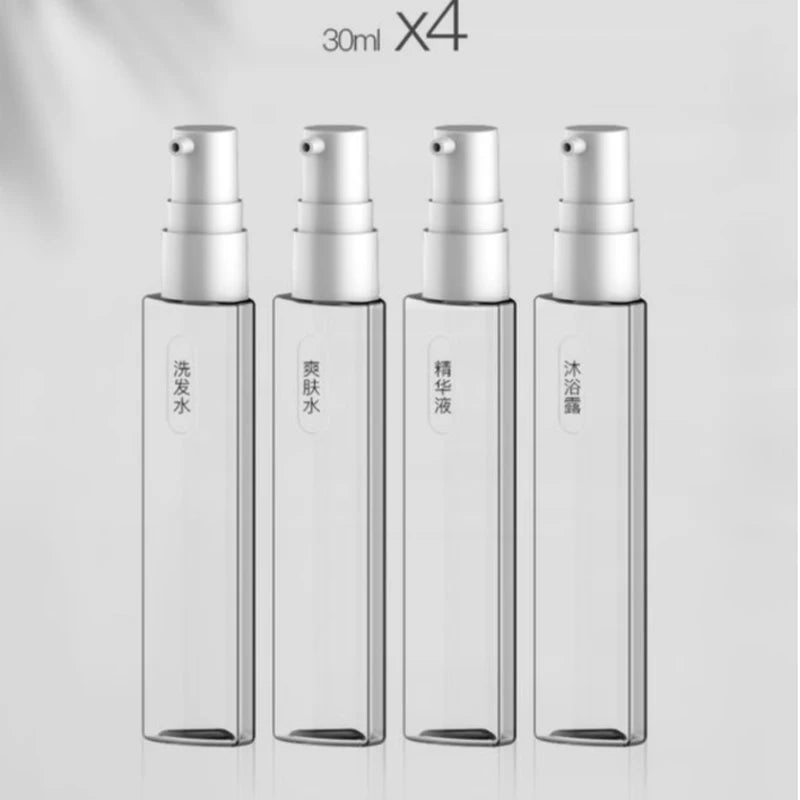 4-in-1 Refillable Travel Dispenser Bottle